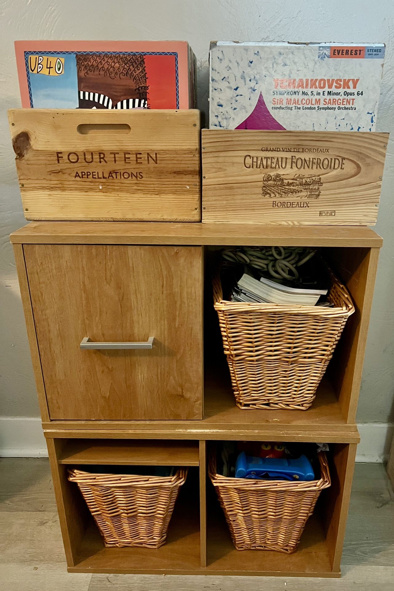 Two wooden stackable storage pieces