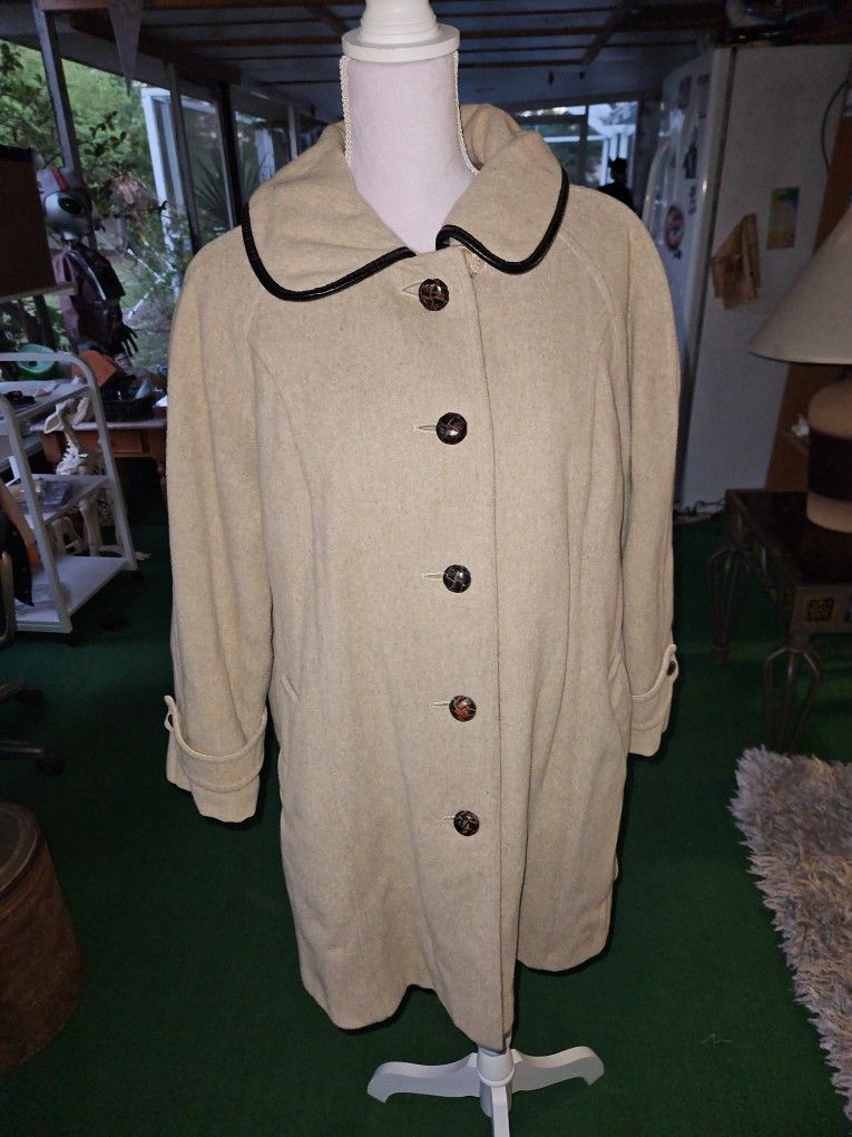 vintage women's Beige wool coat by Penguin Fashions, likely from the 1960s