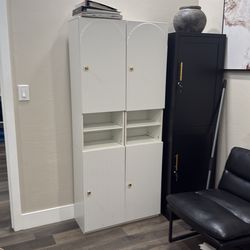 white fluted /arched design cabinet