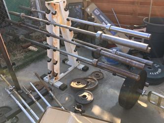 New and used Olympic 7ft bar 45lb barbell