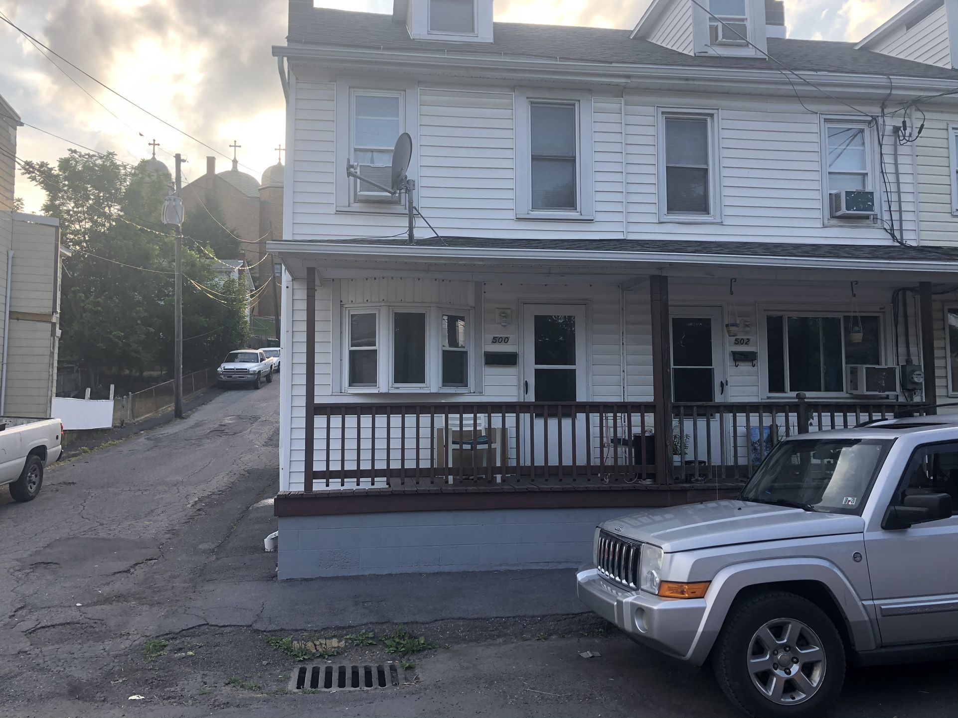 Comer Home & Empty Lot Two Door Away For Parking
