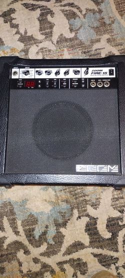 Used in excellent working condition Zoom Fire-15 guitar amp.