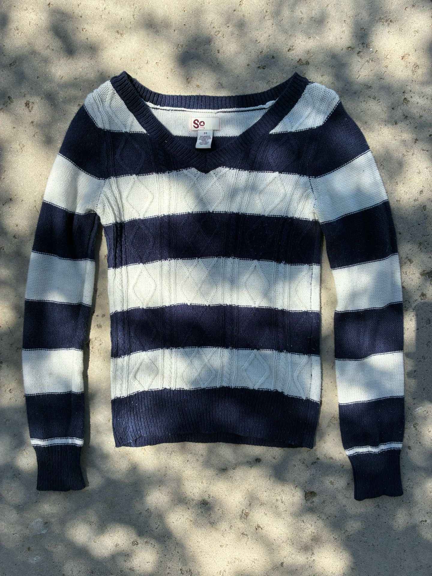 Navy blue and white striped sweater