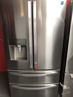 New scratch and dent kenmore stainless steel French door fridge with bottom freezer. 1 year warranty