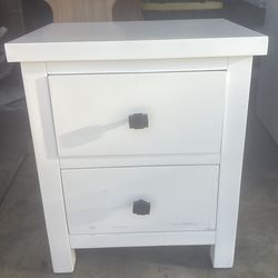 Small white  end table  minor scratches but can be touched up with white  paint