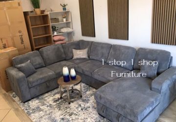 XL sectional sofa with pull-out bed & storage dark grey corduroy