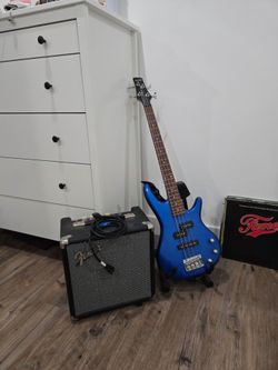 Blue Ibanez Bass Guitar and Fender Amp