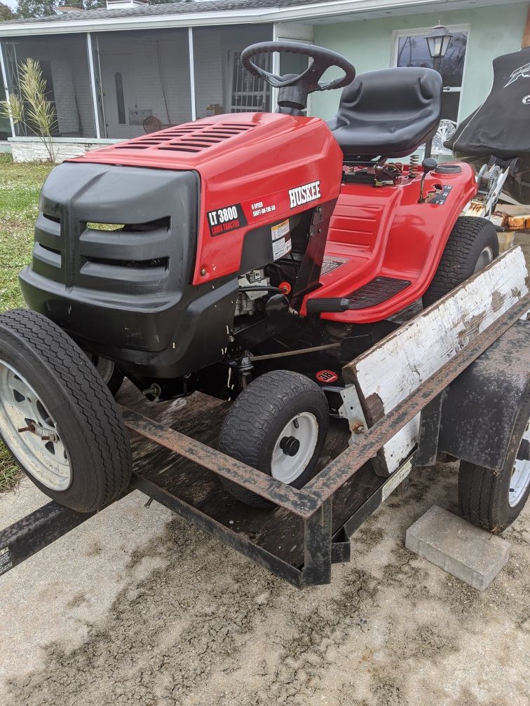 Huskee LT3800 riding mower with utility trailer included