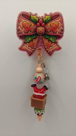 Gingerbread Bow Alligator Badge Reel
