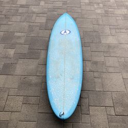7’0” Byrne mid length surfboard 2+1 fin set up