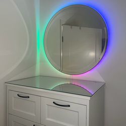 WEST ELM Back lit Mirror 30” with Remote NEW  Works perfectly NEW — never used !!  Change colors, auto setting, speed, brightness   Pick up near Irvin