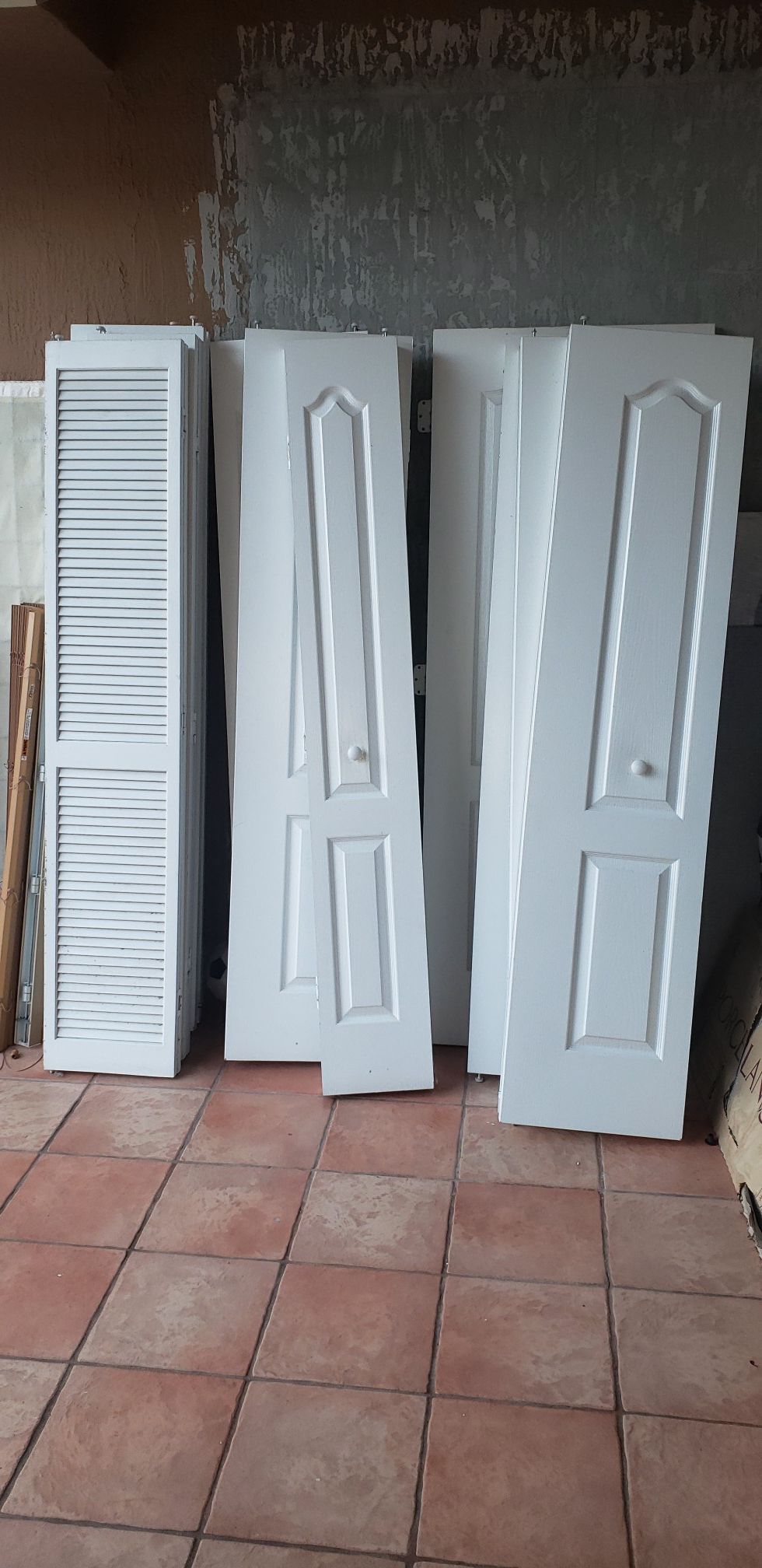 White indoor bi-fold closet doors various sizes