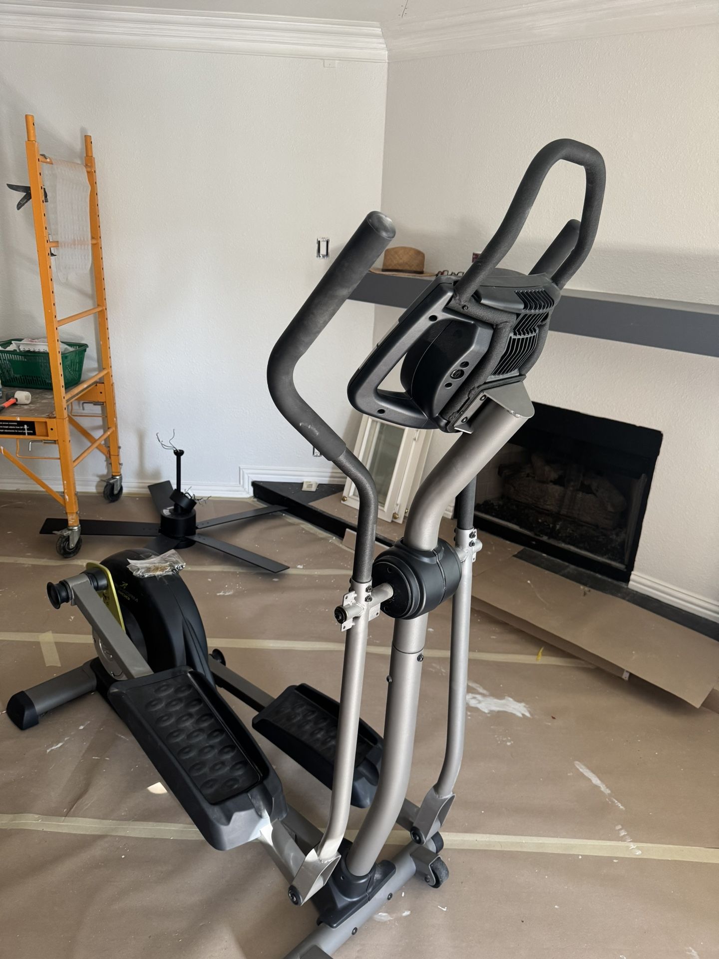 Proform 900 elliptical (folds for space saving)