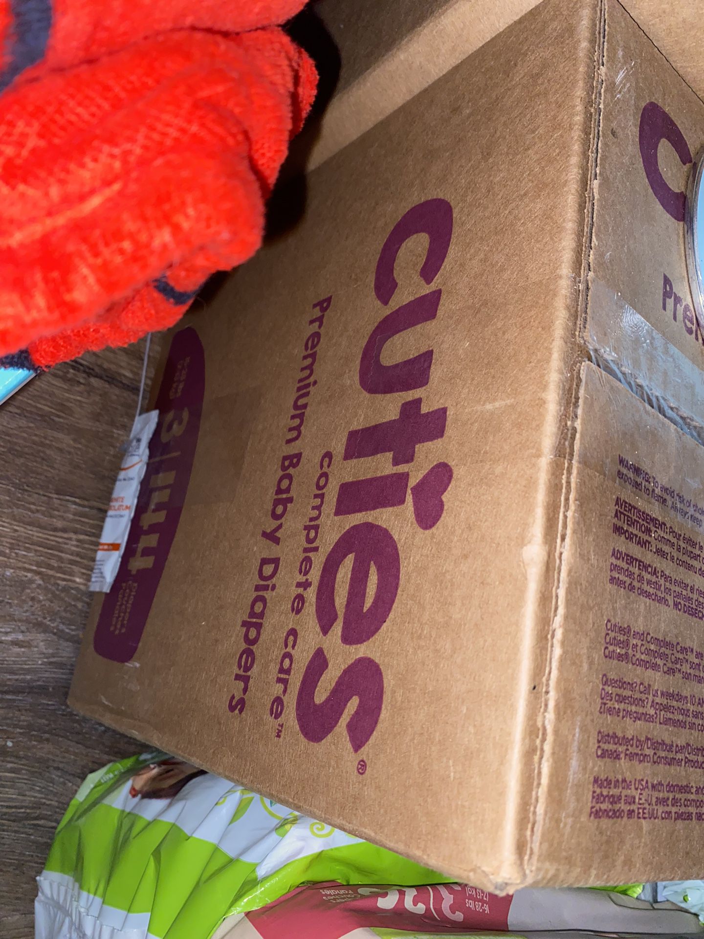 2 Boxes Of #4 Cuties Diapers