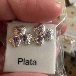 Broquel trebol con zirconia