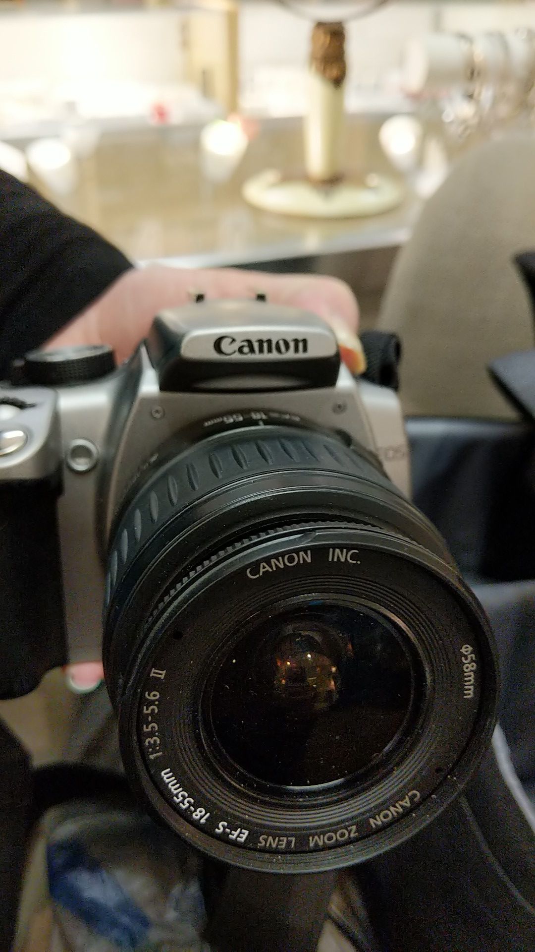 CANON REBEL XT 8 MP WITH ZOOM LENSE