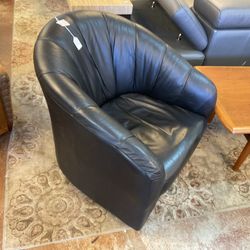 Pair of leather swivel chairs