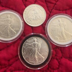 4- 1 oz .999 Silver Coins. Silver Eagles and Liberty Silver
