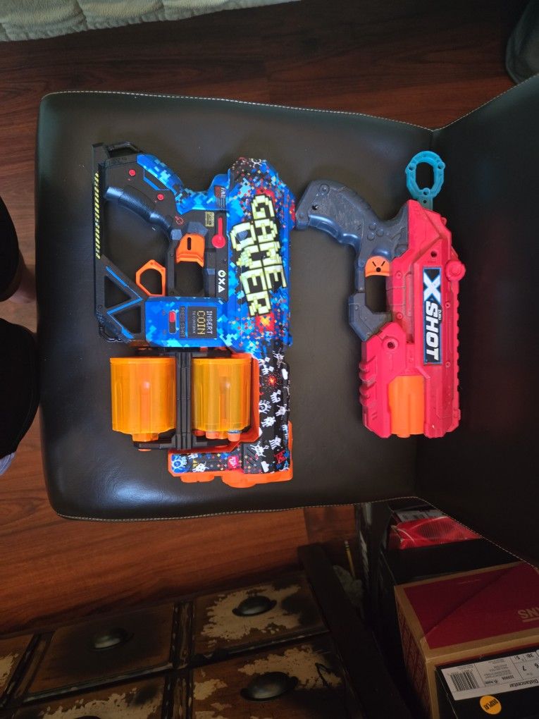 X-shot Hand Guns