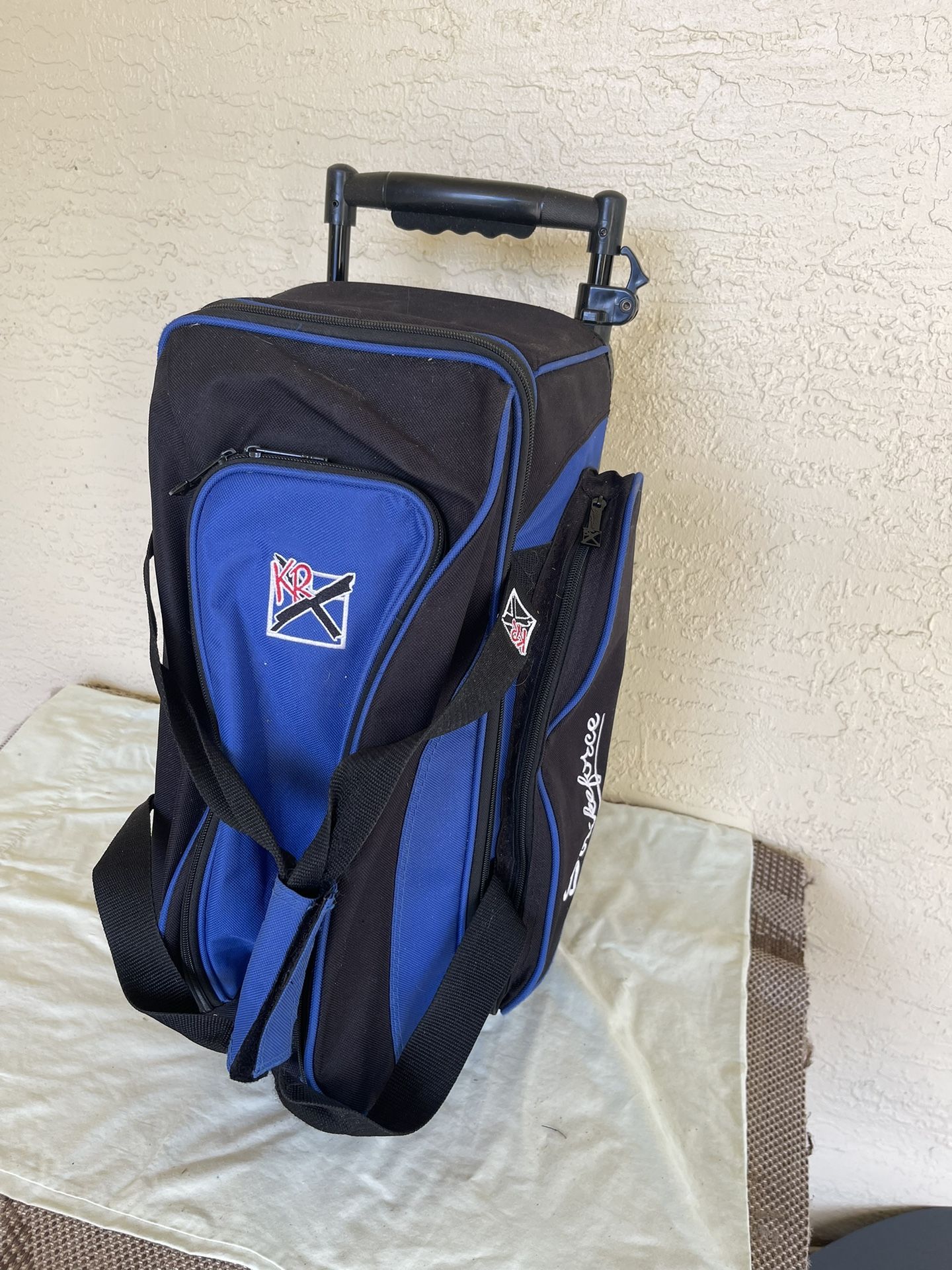 StrikeForce Bowling Bag With Wheels With Set Of 12 Lbs Bowling Balls