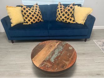 Velvet blue couch and coffee table