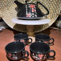 BlackTea Set.  Includes a tea pot  and 4 cups.  Traditional oriental cups . Black & red