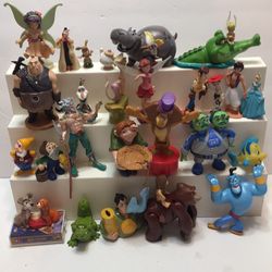 Lots If Disney Figurines