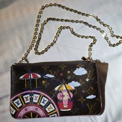 Louis Vuitton
Monogram Vivienne Xmas Double Zip Pochette 2020