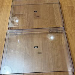 Two (2) Technics Dust Covers