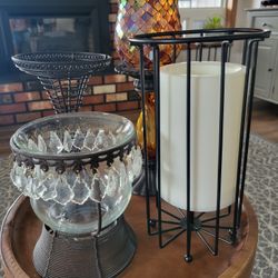 OIL RUBBED BRONZE COLOR CANDLE COLLECTION. 4 PIECES.  COMES WITH BATTERY OPERATED TIMER CANDLE.  ALL IN EXCELLENT CONDITION.  