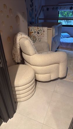 Crate and barrel nursery chair and ottoman