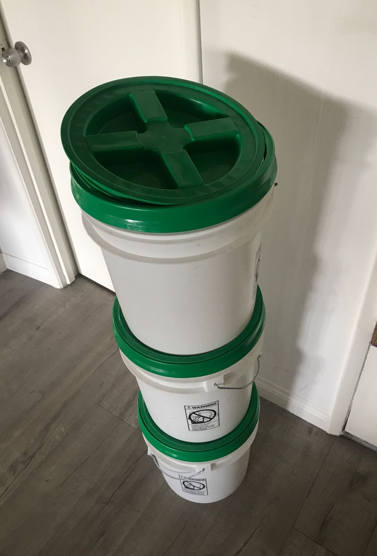 3.5gal storage containers with sealed lids.