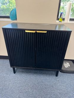 Black Fluted Two-Door Cabinet with Gold Handles
