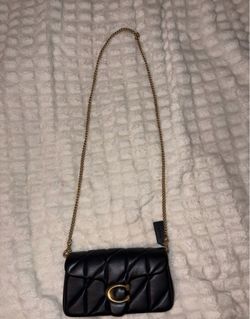 Black Coach quilted strap