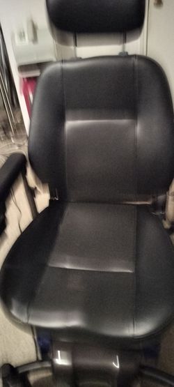 Charger Blue and black power wheelchair.