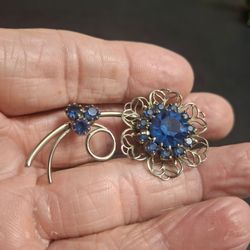 Vintage Blue Rhinestone Filagree Flower Silvertone Brooch 2"