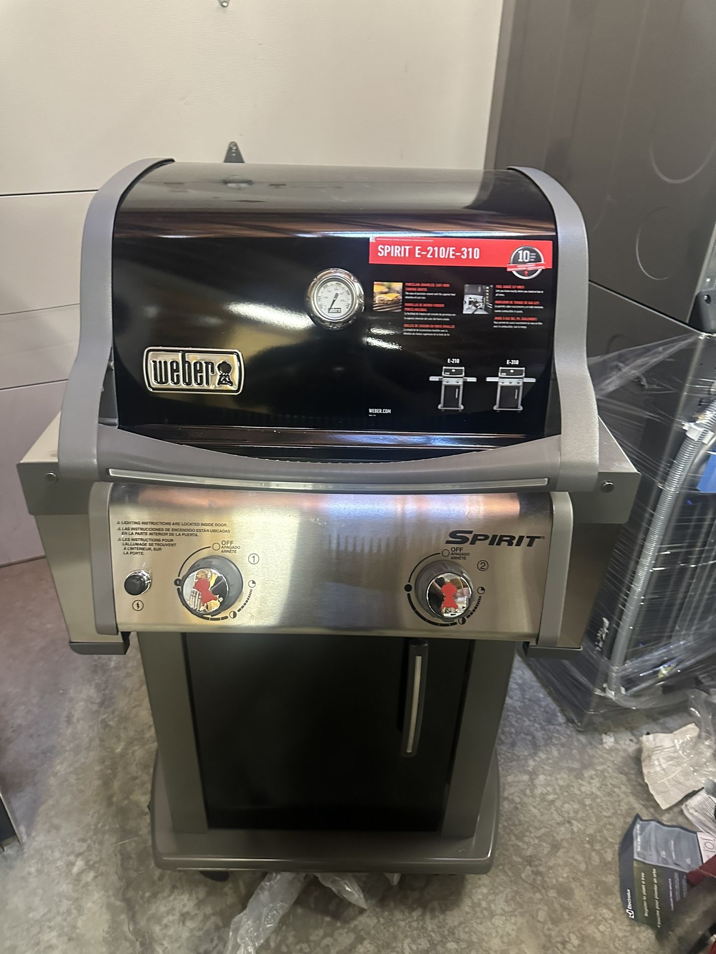 Brand New Weber Two Burner Model Number E 210