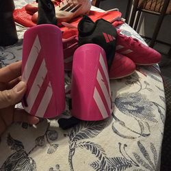 Adidas soccer cleats and shin guards girls