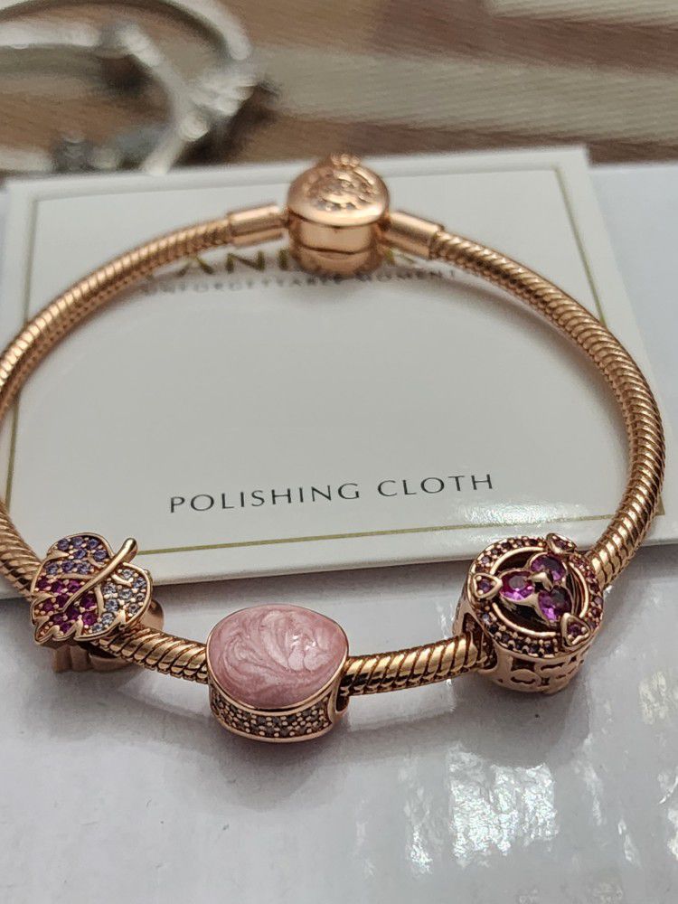 Rose Gold Pandora Bracelet With Charms 
