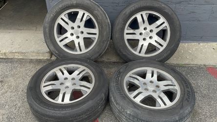 Mitsubishi Endeavor 17-inch aluminum wheels with old tires 5 on 4.5 inch lug pattern 