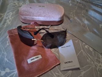 BEAUTIFUL MIU MIU SUNGLASSES