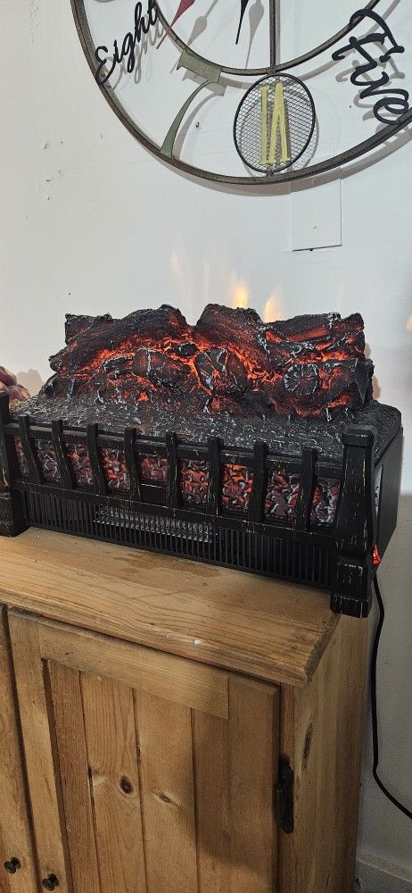 FAUX.. LOGS. HEATER
