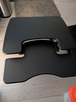 Sit to stand desks
