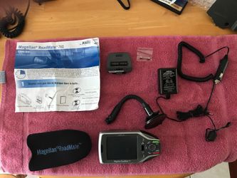 Magellan road mate 760 GPS with xtra case and home charger mobile charger and windshield clip