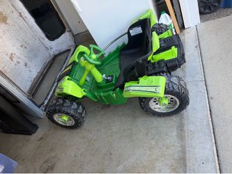 Power Wheels Dune Racer Extreme 12-volt battery-powered ride-on toy in green.