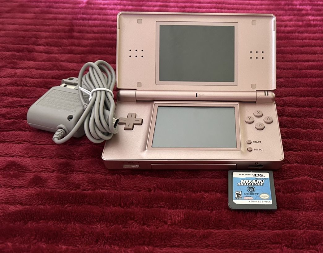 Nintendo DS Lite with a game, complete with a stylus, and new charger. $35