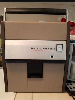 Vintage Bell and how explorer 500 automatic 754 slide projector