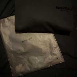 All black essential hoodie size medium