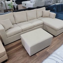 New 2pc Sectional And Ottoman In Sand 