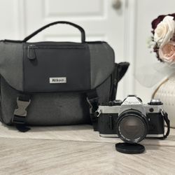 Canon AE-1 Program 35mm Film Camera with Canon FD 50mm f/1.4 Lens + Bag – $350 